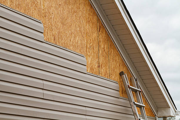 Professional Emergency Siding Repair technician working in Liberty, KY